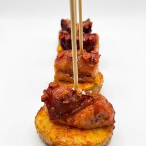 Pop a la brasa amb patata al caliu
